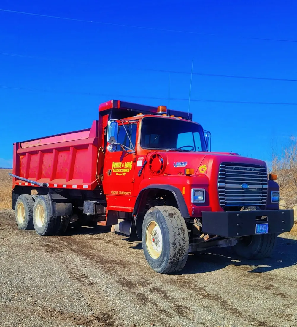 Prince and Long red dump truck for rock dirt and aggregate hauling